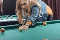 young beautiful caucasian woman playing in pool Royalty Free Stock Photo