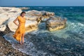 Young beautiful caucasian woman walking on the beach Royalty Free Stock Photo