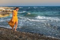 Young beautiful caucasian woman walking on the beach Royalty Free Stock Photo