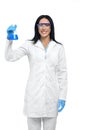 Young beautiful chemist working with dangerous liquids. Royalty Free Stock Photo