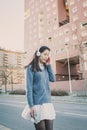 Young beautiful Chinese girl with headphones