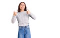 Young beautiful chinese girl wearing casual clothes success sign doing positive gesture with hand, thumbs up smiling and happy Royalty Free Stock Photo