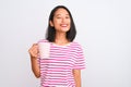 Young beautiful chinese woman drinking cup of coffee over isolated white background with a happy face standing and smiling with a Royalty Free Stock Photo