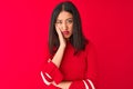 Young beautiful chinese woman wearing casual dress standing over isolated red background thinking looking tired and bored with Royalty Free Stock Photo