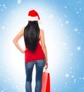 Young and beautiful Christmas shopper girl Royalty Free Stock Photo