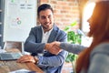 Young beautiful couple of business workers smiling happy and confident Royalty Free Stock Photo