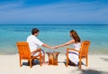 Young beautiful couple enjoying on a tropical beac Royalty Free Stock Photo