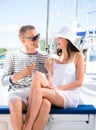 Young and beautiful couple have a party on a luxury sailing boat Royalty Free Stock Photo