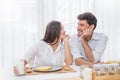 Young beautiful couple having breakfast Royalty Free Stock Photo