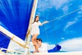 Young beautiful couple having fun on a tropical beach . Tropical Royalty Free Stock Photo