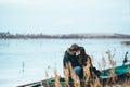 Young beautiful couple on the ice of a frozen lake Royalty Free Stock Photo