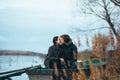 Young beautiful couple on the ice of a frozen lake Royalty Free Stock Photo