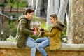 Young beautiful couple in love celebrating Valentines day presents and rose Royalty Free Stock Photo