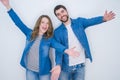 Young beautiful couple standing together over white isolated background looking at the camera smiling with open arms for hug Royalty Free Stock Photo