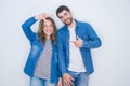 Young beautiful couple standing together over white isolated background smiling making frame with hands and fingers with happy Royalty Free Stock Photo