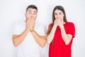 Young beautiful couple together over white isolated background shocked covering mouth with hands for mistake Royalty Free Stock Photo