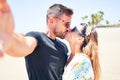 Young beautiful couple on vacation smiling happy and confident making selfie by camera Royalty Free Stock Photo