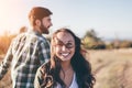 Young beautiful couple walking outside on beautiful sunset. Royalty Free Stock Photo