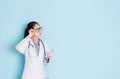 Young beautiful doctor woman touching glasses Royalty Free Stock Photo