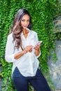 Young Beautiful East Indian American Woman with long hair traveling in New York City Royalty Free Stock Photo