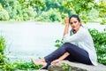 Young Beautiful East Indian American Woman traveling, relaxing at Central Park, New York