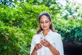 Young Beautiful East Indian American Woman traveling, relaxing outdoor in New York City Royalty Free Stock Photo