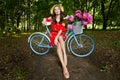 Young beautiful, elegantly dressed woman with retro bicycle. Healthy, cycling. Royalty Free Stock Photo