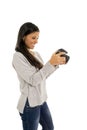 Young beautiful exotic hispanic photographer woman smiling happy looking reflex camera Royalty Free Stock Photo