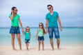 Young beautiful family of four enjoyed relaxing on Royalty Free Stock Photo