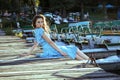 Young beautiful fashion model posing on pier Royalty Free Stock Photo