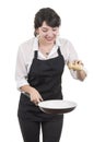 Young beautiful female chef wearing black apron Royalty Free Stock Photo