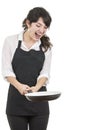 Young beautiful female chef wearing black apron Royalty Free Stock Photo