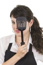 Young beautiful female chef wearing black apron Royalty Free Stock Photo