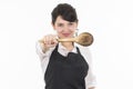 Young beautiful female chef wearing black apron Royalty Free Stock Photo