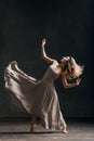 Young beautiful female dancer is posing in the studio Royalty Free Stock Photo