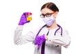Young beautiful female doctor holding urine sample in her hands in medical mask and sterile gloves with thumbs down on Royalty Free Stock Photo