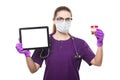 Young beautiful female doctor holding urine sample and tablet in her hands in medical mask and sterile gloves on white Royalty Free Stock Photo