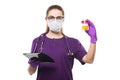 Young beautiful female doctor holding urine sample and tablet in her hands in medical mask and sterile gloves on white Royalty Free Stock Photo