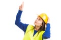 Young beautiful female engineer pointing up