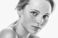 Young beautiful freckles woman face portrait with healthy skin b Royalty Free Stock Photo