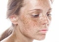 Young beautiful freckles woman face portrait with healthy skin Royalty Free Stock Photo