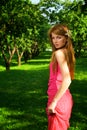 Young beautiful girl in apple orchard Royalty Free Stock Photo