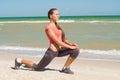 Young beautiful girl athlete playing sports on the beach Royalty Free Stock Photo