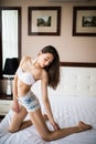 Young beautiful girl bed in the morning at home Royalty Free Stock Photo