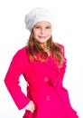 Young beautiful girl in a beret and red coat Royalty Free Stock Photo