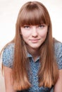 Young beautiful girl in blue blouse