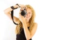 The young beautiful girl with the camera Royalty Free Stock Photo