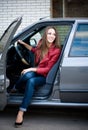 Young beautiful girl in car. Happy smiling woman. Royalty Free Stock Photo