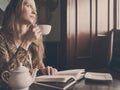 A young beautiful girl with a cup of tea Royalty Free Stock Photo