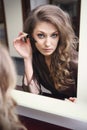 Beautiful girl does makeup Royalty Free Stock Photo